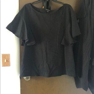 Black blouse with flared sleeves